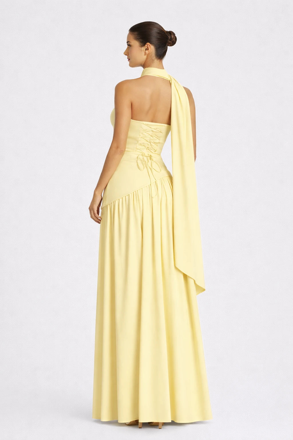 Elara Dress yellow strapless draped maxi evening gown full back view with flowing skirt Vayana Clothing