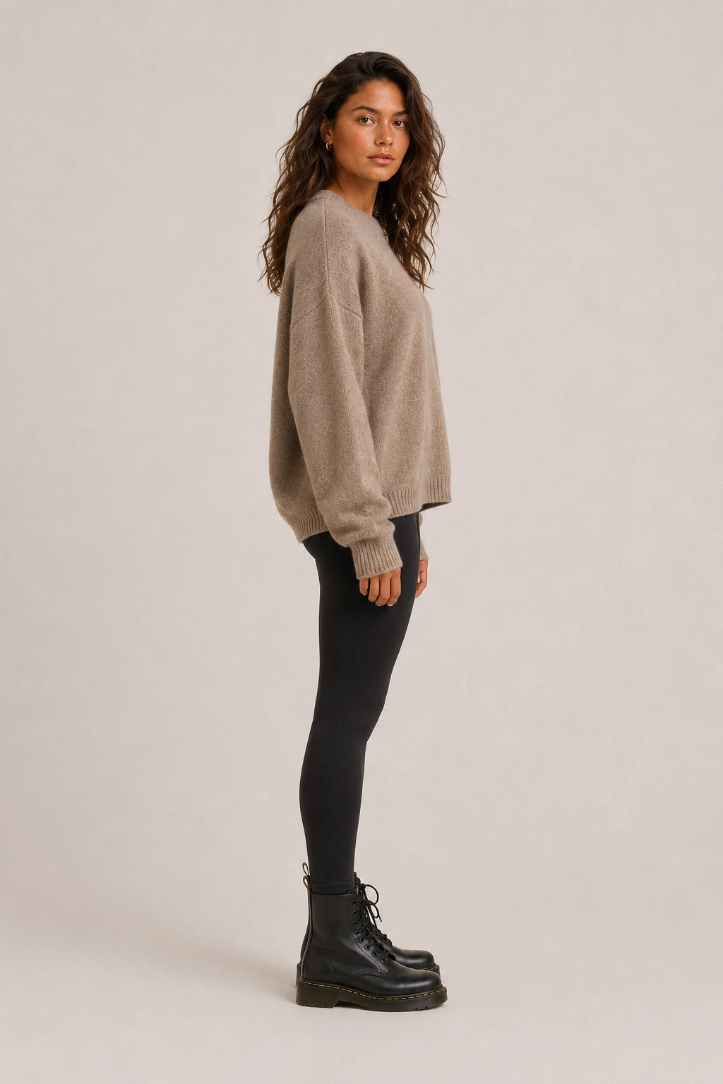 Beige crewneck knit sweater with ribbed cuffs and hem, draped sleeves