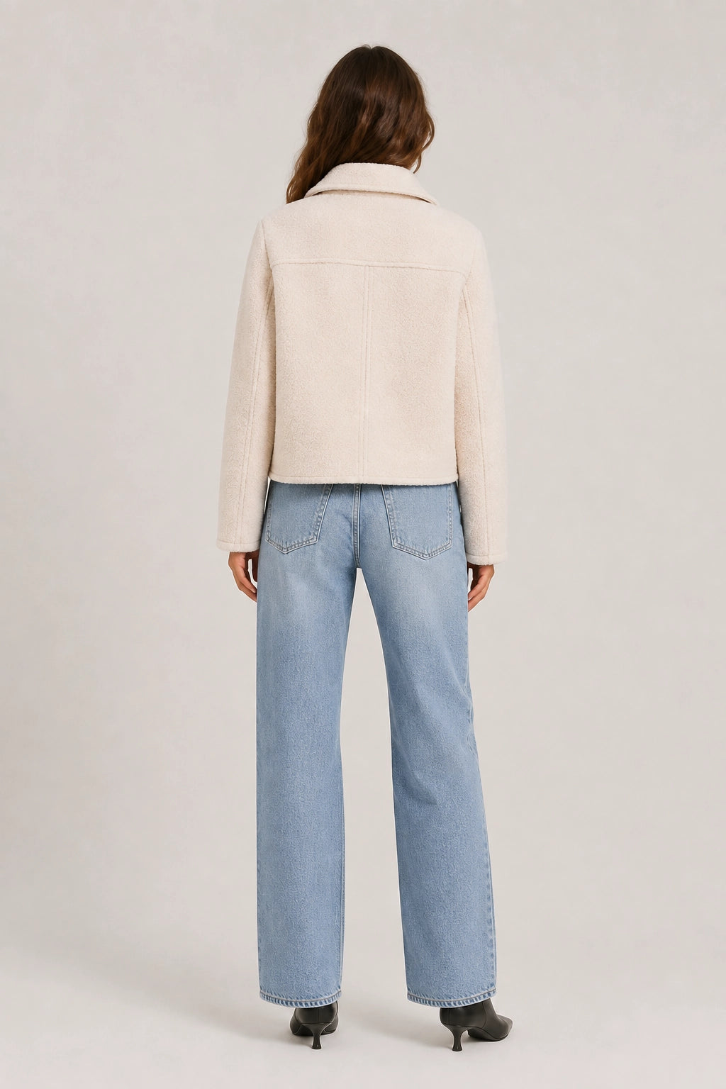 Beige Aspen jacket, back view with stand collar and seam detailing