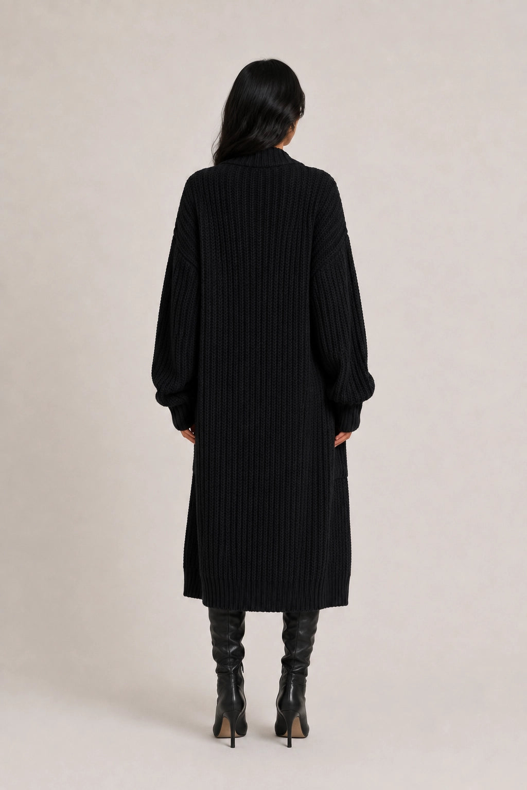 Black rib-knit cardigan with long sleeves and button-front, back view