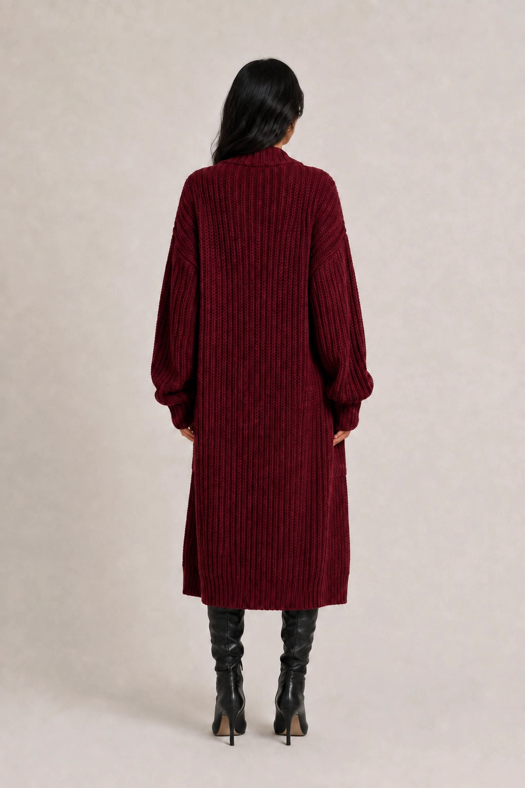 Back view of burgundy long rib-knit cardigan with full-length sleeves