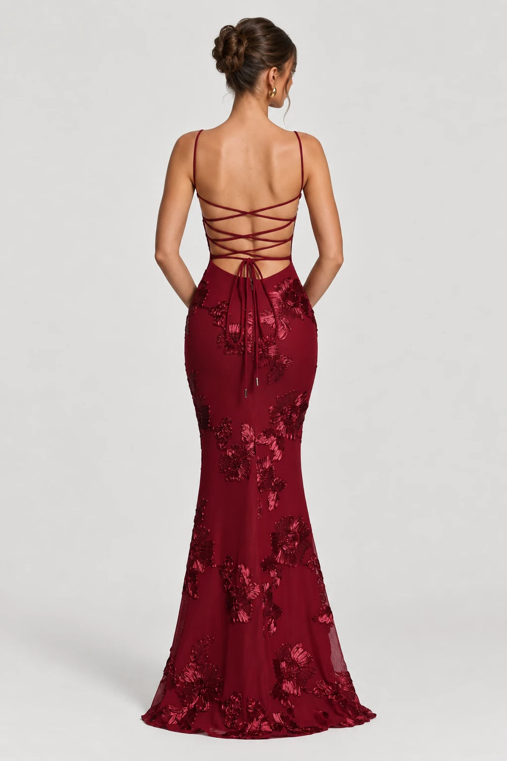 Burgundy floral corset maxi dress with fitted silhouette, back view