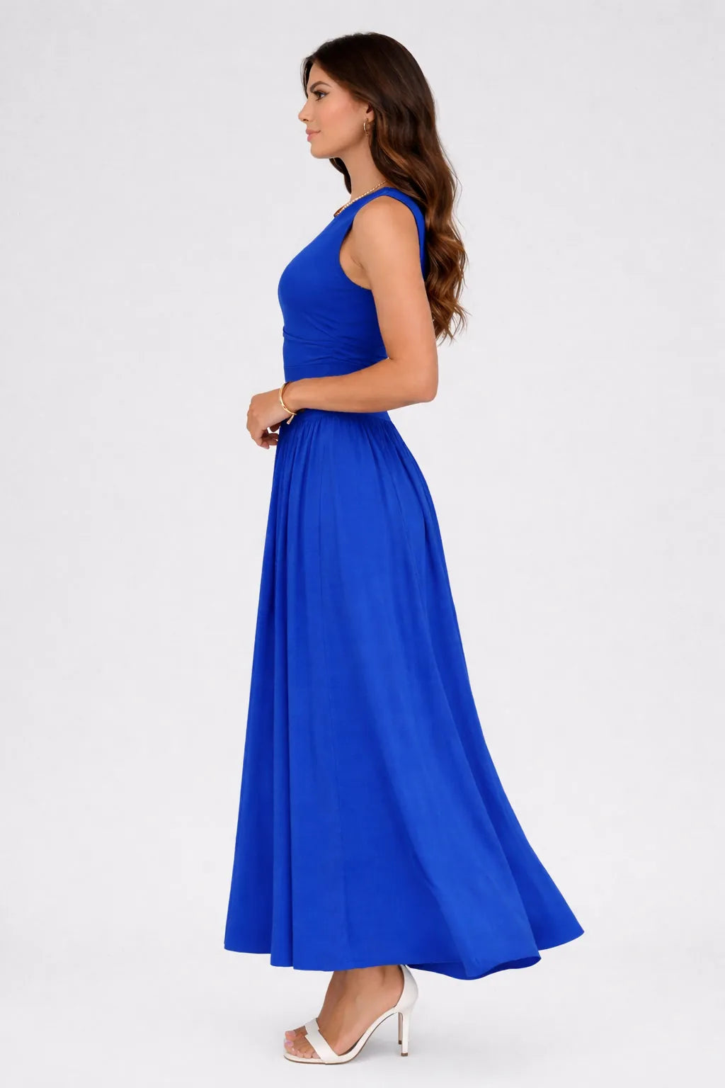 Velouria Dress blue sleeveless crew neck fitted waist flared maxi dress side view Vayana Clothing