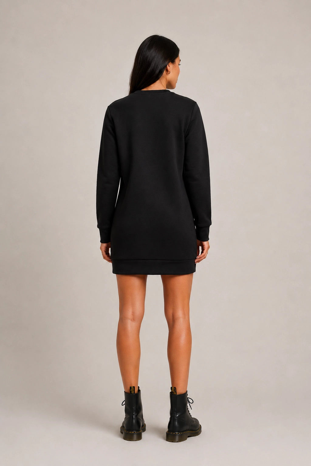 Black crew-neck long-sleeve shift dress viewed from the back, straight hem